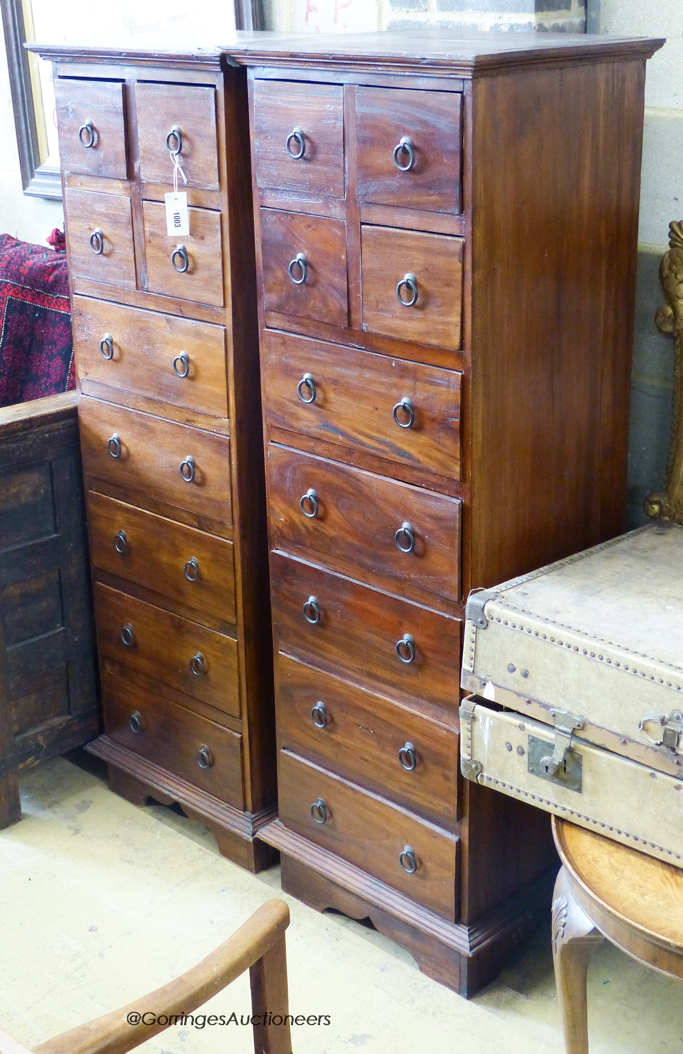 A near pair of Indonesian hardwood tall chests. W-50, D-43, H-150cm.